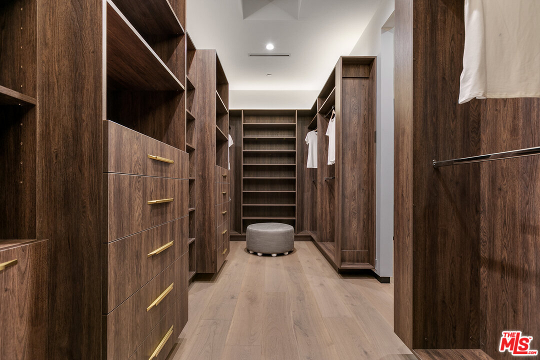 1461 Rising Glen Road Los Angeles, CA 90069 - Photo 18 of 22 a view of hallway with stairs and furniture
