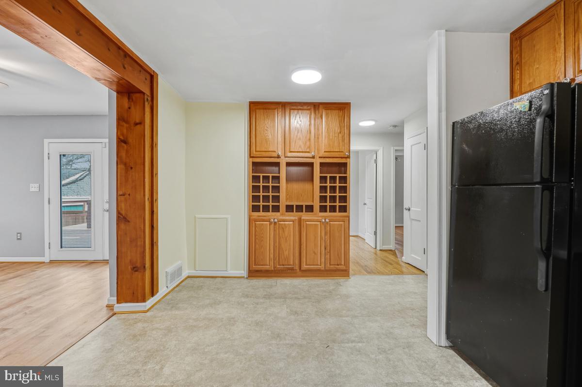 4810 Odell Road Beltsville, MD 20705 - Photo 12 of 30 a view of a kitchen with refrigerator and cabinet
