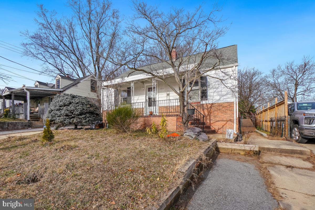 4810 Odell Road Beltsville, MD 20705 - Photo 2 of 30 a view of a house with a yard covered in snow