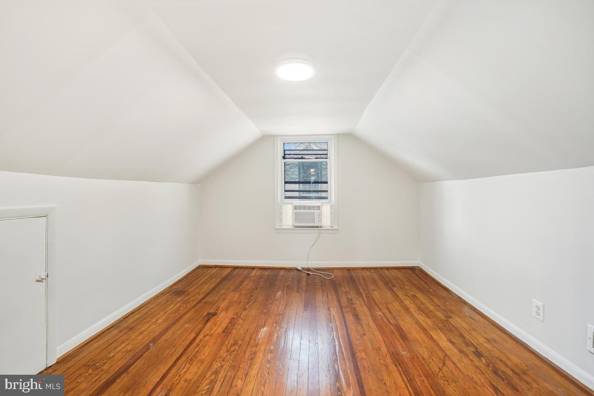 4810 Odell Road Beltsville, MD 20705 - Photo 26 of 30 a view of a room with wooden floor and windows