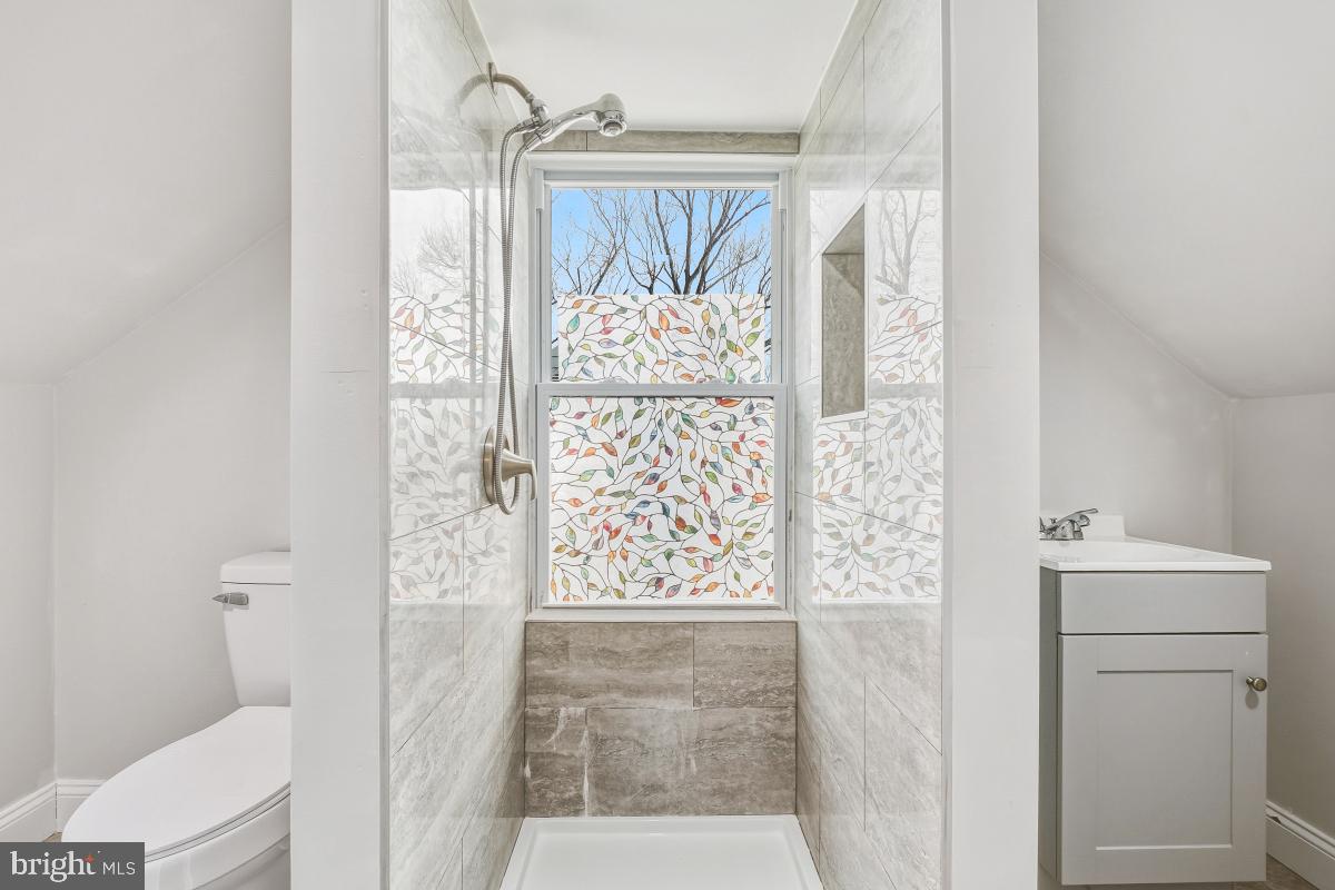 4810 Odell Road Beltsville, MD 20705 - Photo 27 of 30 a bathroom with a window and a shower