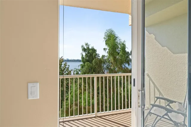 a spacious en suite bathroom with a double sink and mirror