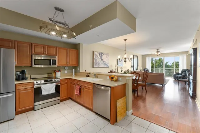 a kitchen with lots of counter top space and appliances