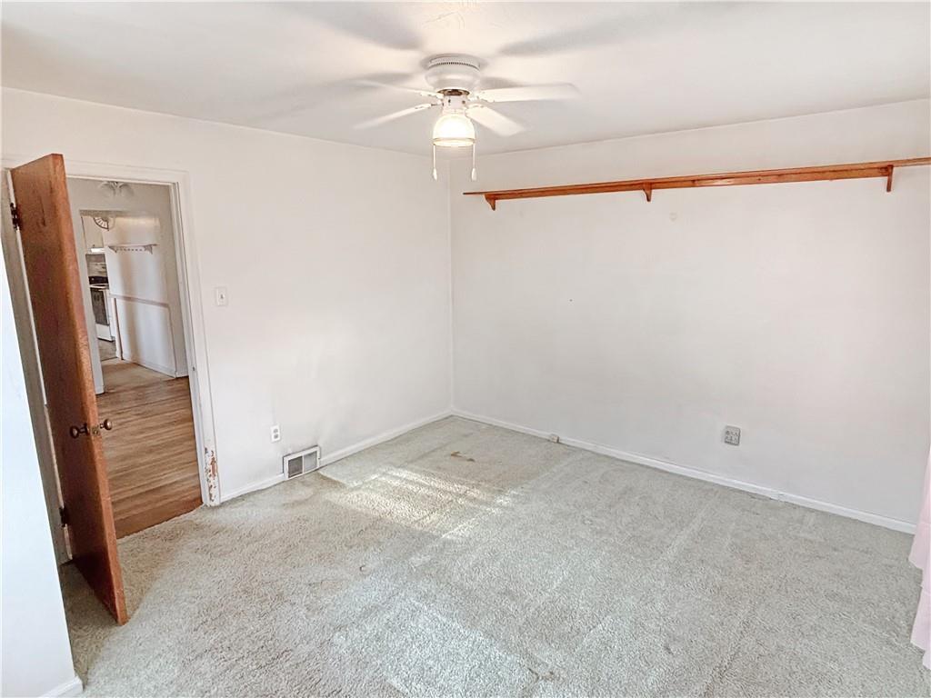 1701 Indiana Avenue Monaca, PA 15061 - Photo 17 of 33 an empty room with windows and entrance