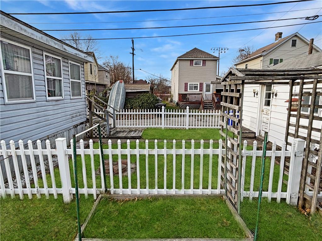 1701 Indiana Avenue Monaca, PA 15061 - Photo 31 of 33 a front view of a house with a garden