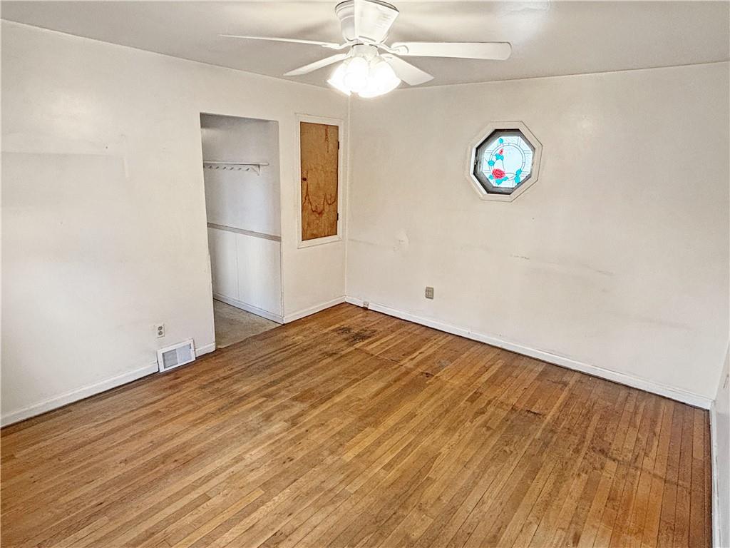 1701 Indiana Avenue Monaca, PA 15061 - Photo 6 of 33 a view of empty room with wooden floor