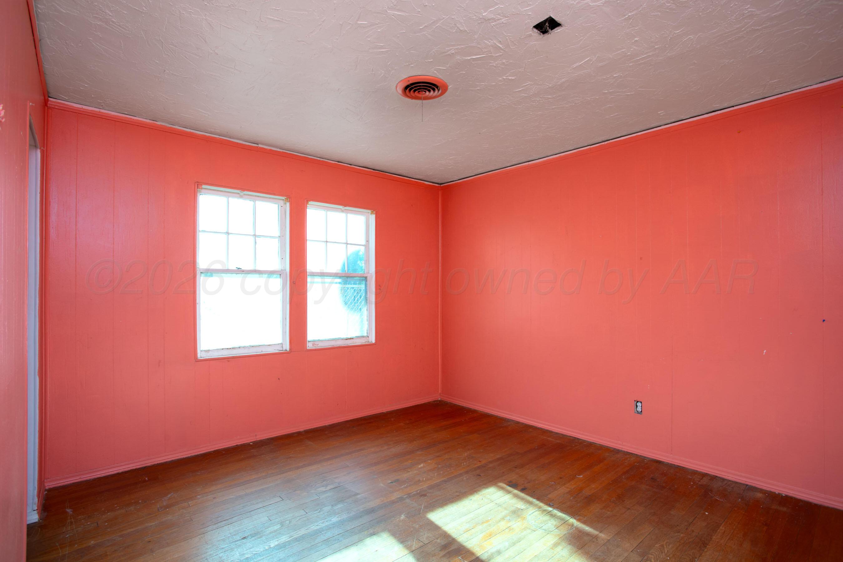 4223 Southwest 11th Avenue Amarillo, TX 79106 - Photo 17 of 26 an empty room with a window