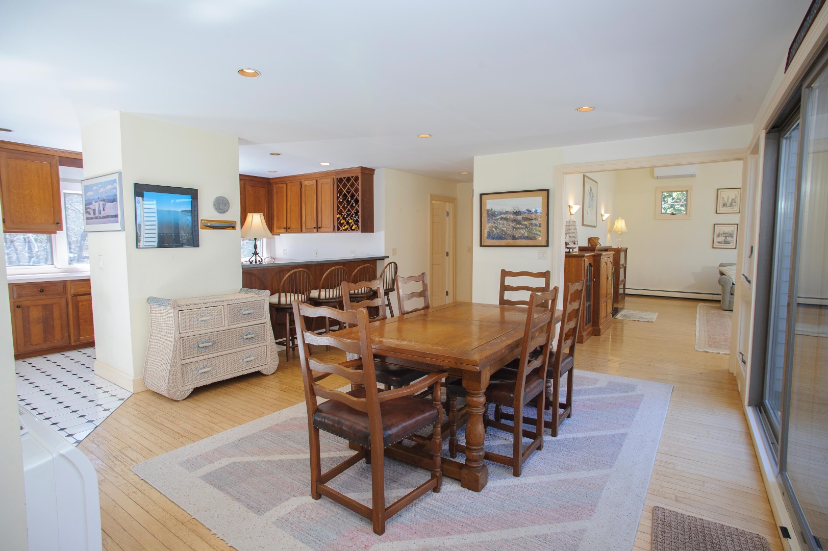 237 Lagoon Pond Road Vineyard Haven, MA 02568 - Photo 8 of 21 a view of a dining room with furniture and wooden floor