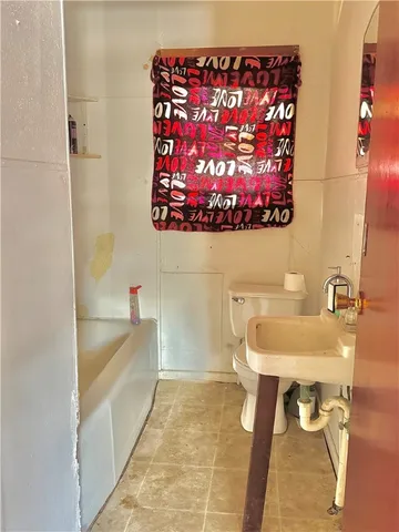 a bathroom with a sink and a bathtub