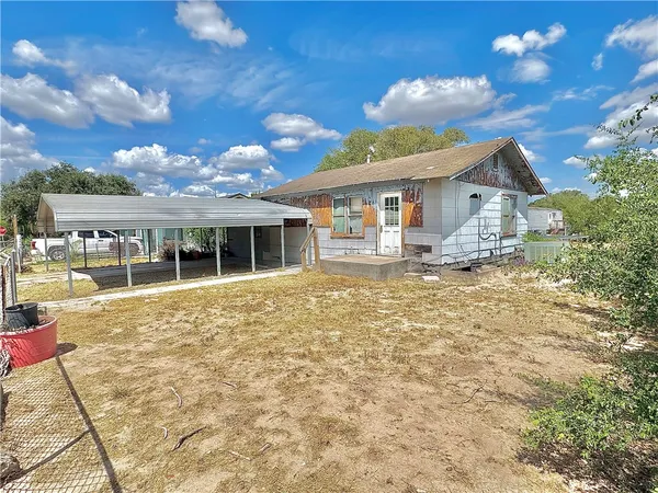 a house view with a garden space