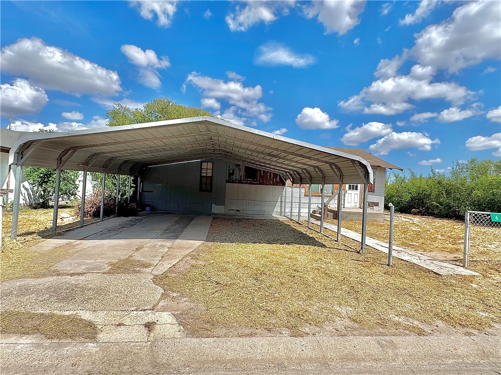 604 East Magnolia Street Freer, TX 78357 - Photo 3 of 17 a view of a porch