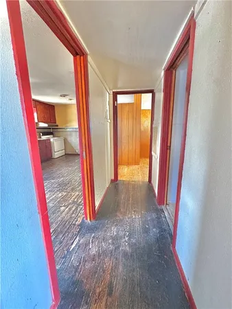 a view of front door and bedroom