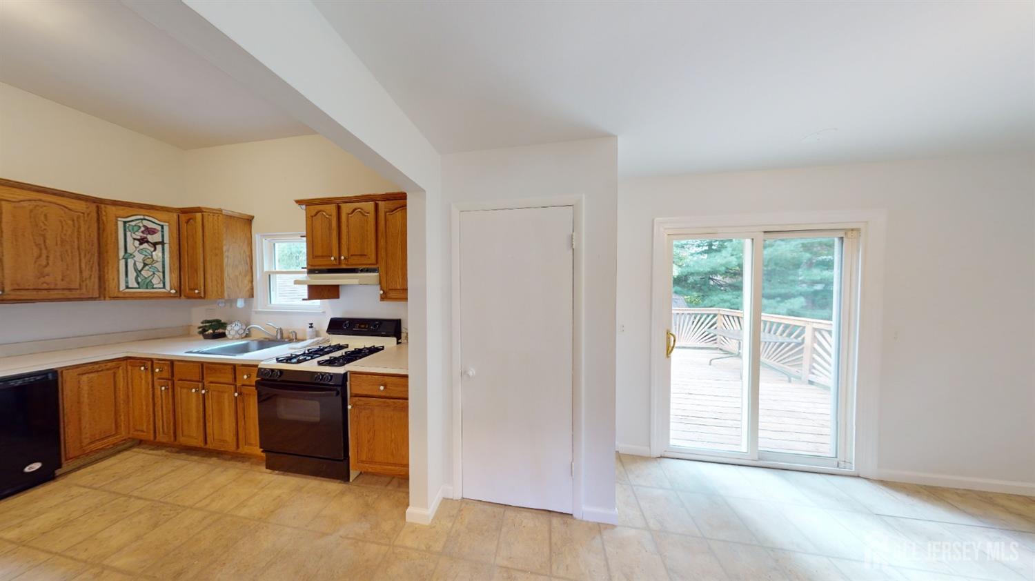 3 Donald Road East Brunswick, NJ 08816 - Photo 13 of 62 a view of a kitchen with a sink cabinets and a window