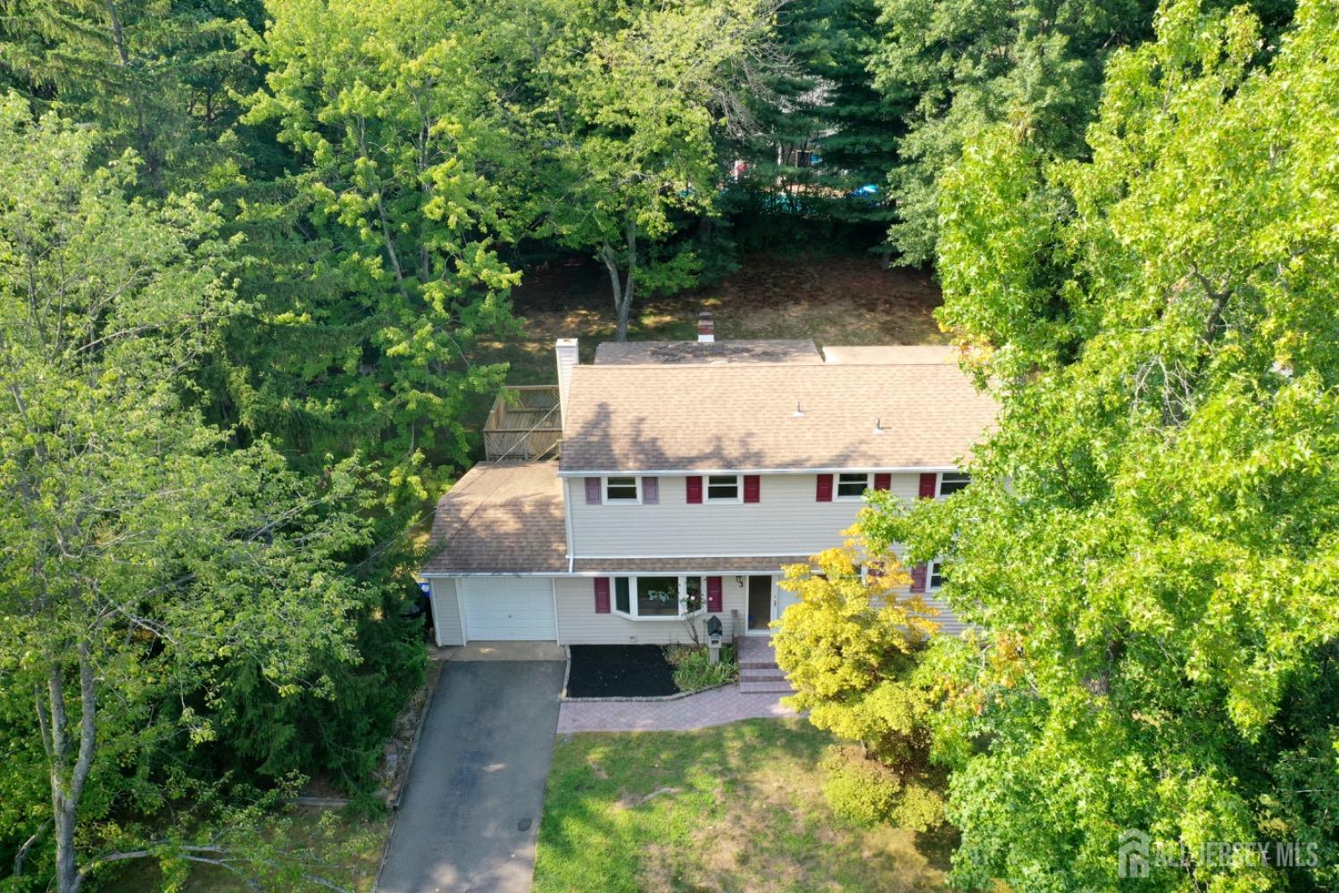 3 Donald Road East Brunswick, NJ 08816 - Photo 36 of 62 an aerial view of a house with a yard