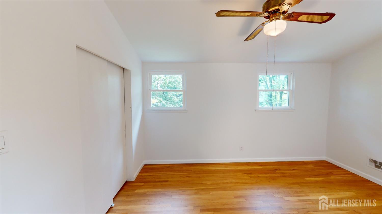 3 Donald Road East Brunswick, NJ 08816 - Photo 42 of 62 a view of a room with a window and a ceiling fan