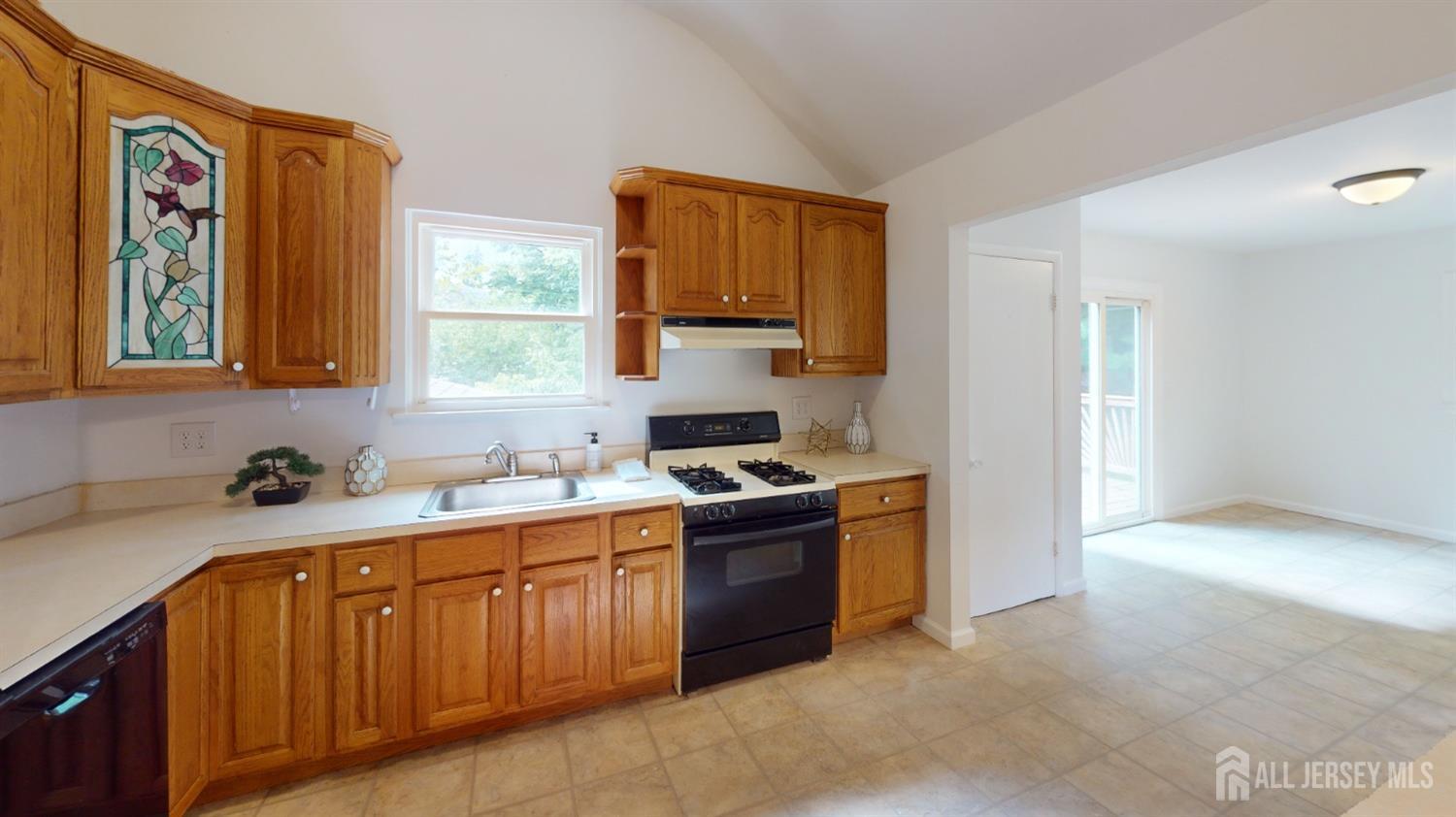 3 Donald Road East Brunswick, NJ 08816 - Photo 5 of 62 a kitchen with a stove and a sink