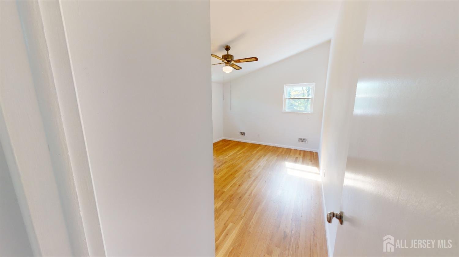 3 Donald Road East Brunswick, NJ 08816 - Photo 60 of 62 a view of room with a ceiling fan
