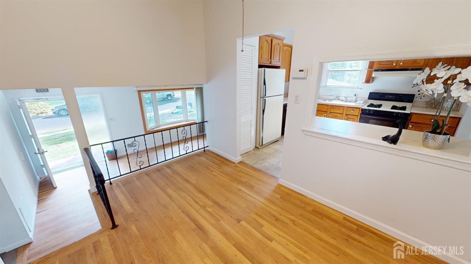 3 Donald Road East Brunswick, NJ 08816 - Photo 8 of 62 a bedroom with furniture and a wooden floor
