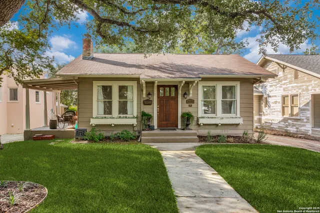 a view of a house with a garden