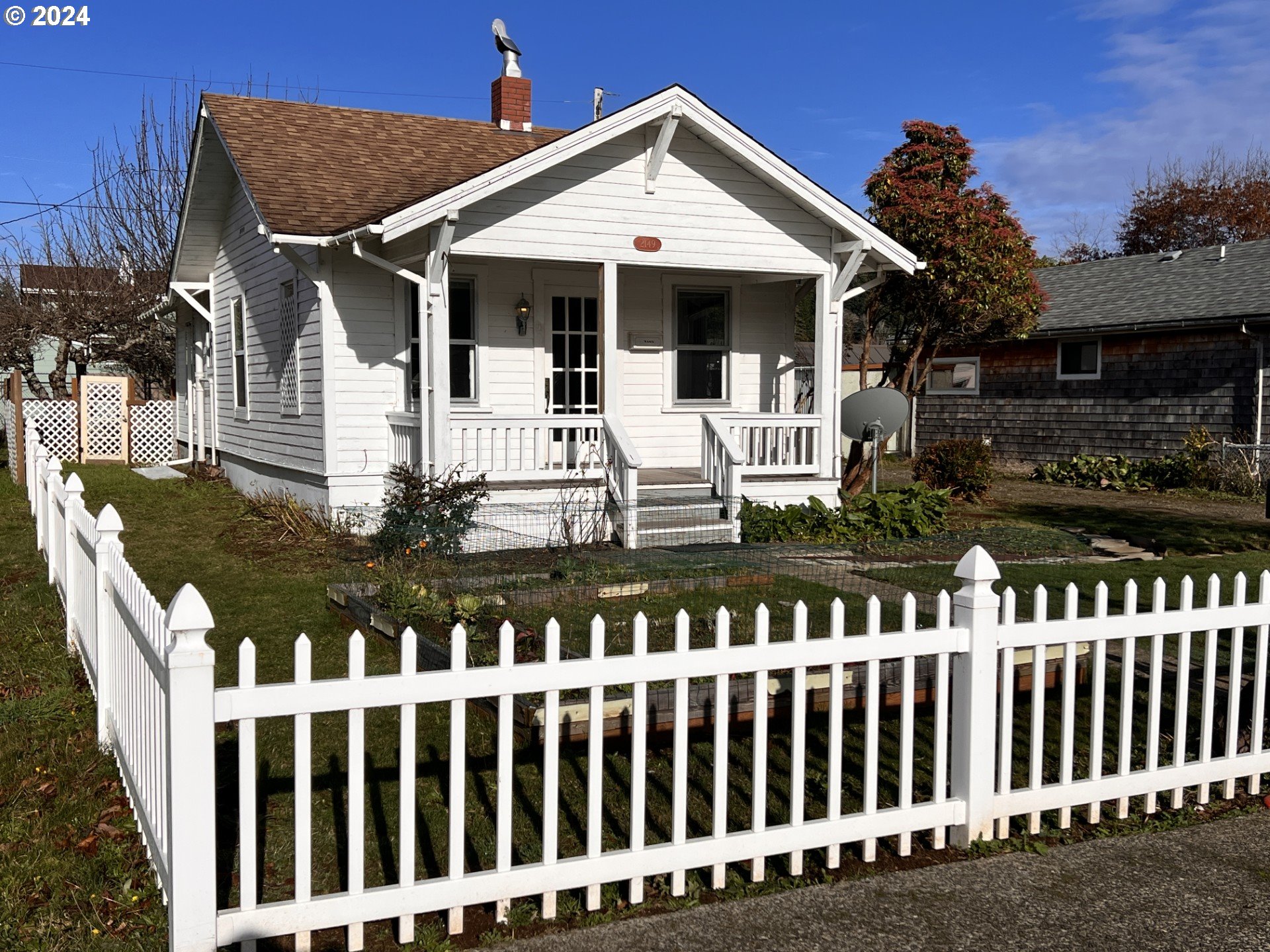 a front view of a house with a porch