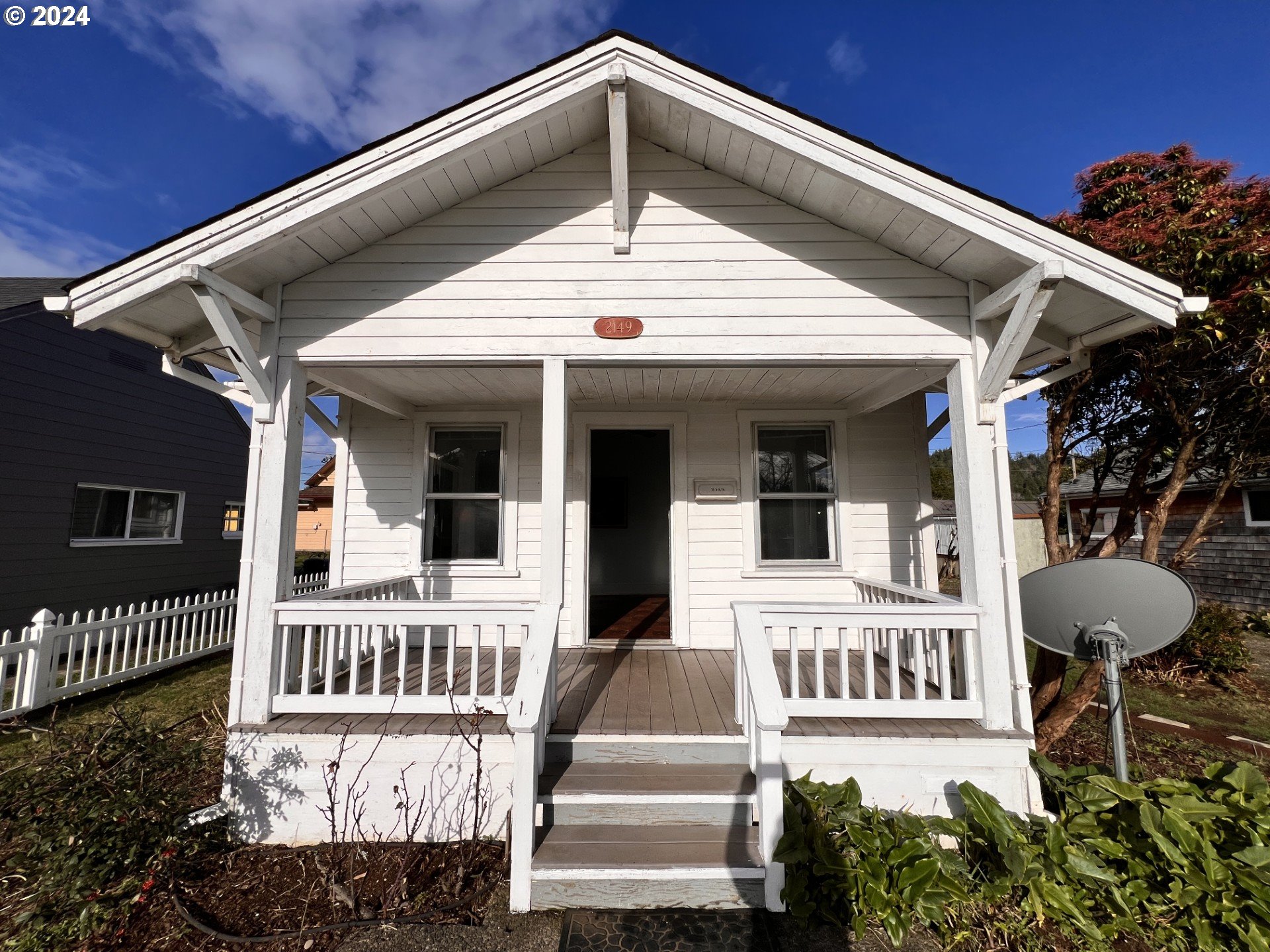 2149 Dogwood Avenue Reedsport, OR 97467 - Photo 2 of 41 a front view of a house with a yard