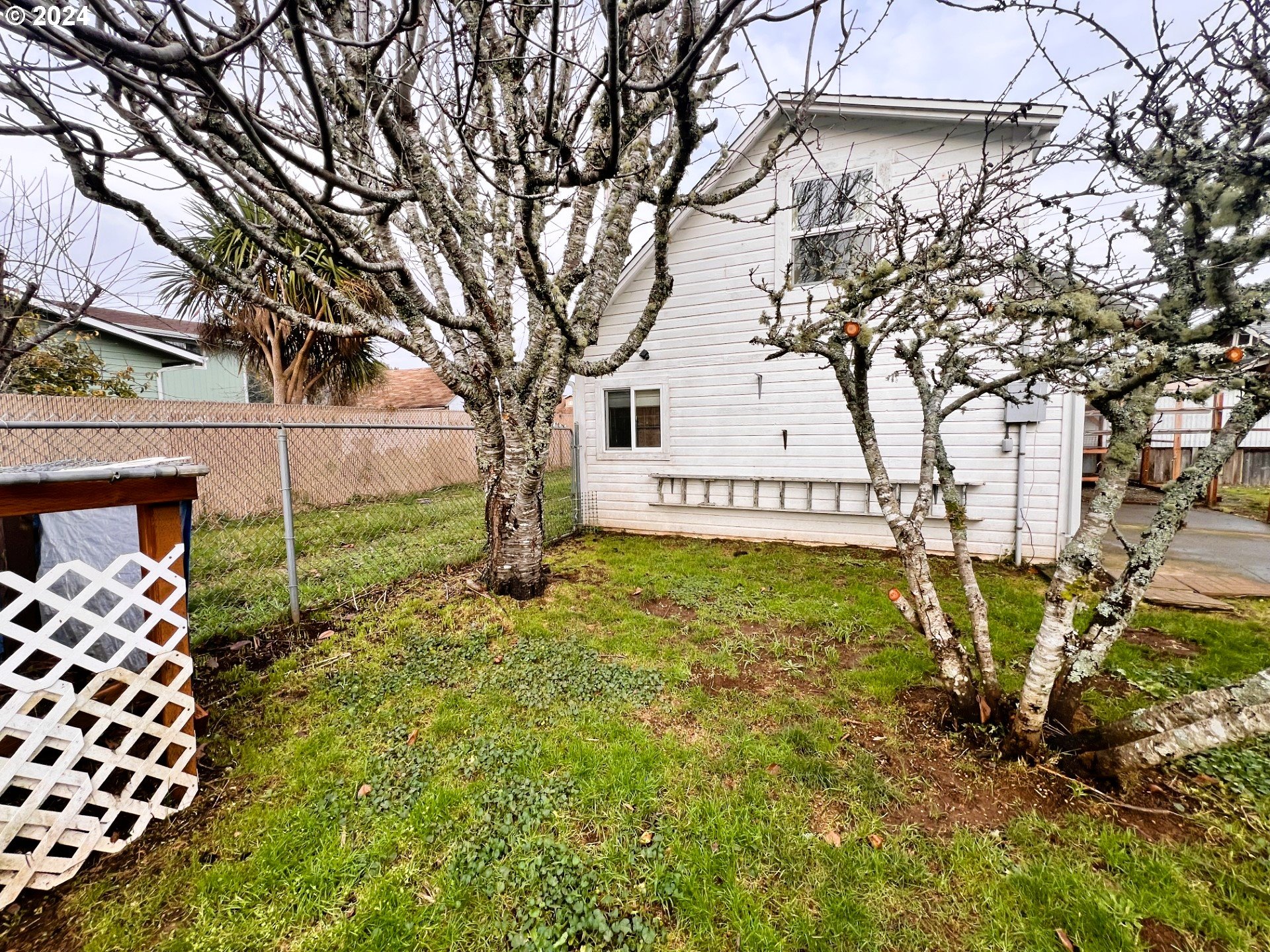 2149 Dogwood Avenue Reedsport, OR 97467 - Photo 37 of 41 a house with garden in front of it