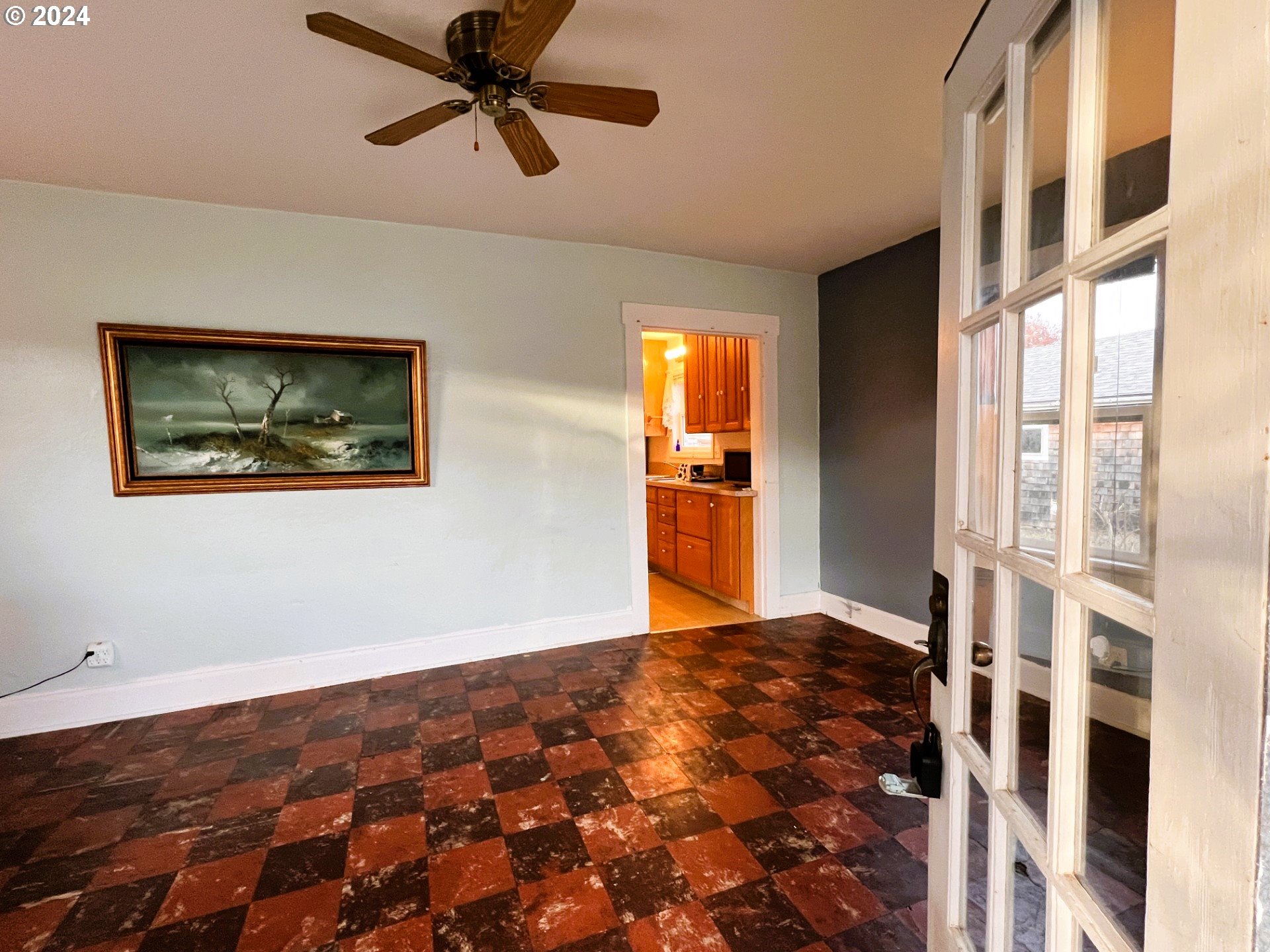 2149 Dogwood Avenue Reedsport, OR 97467 - Photo 4 of 41 a view of an empty room with window and wooden floor