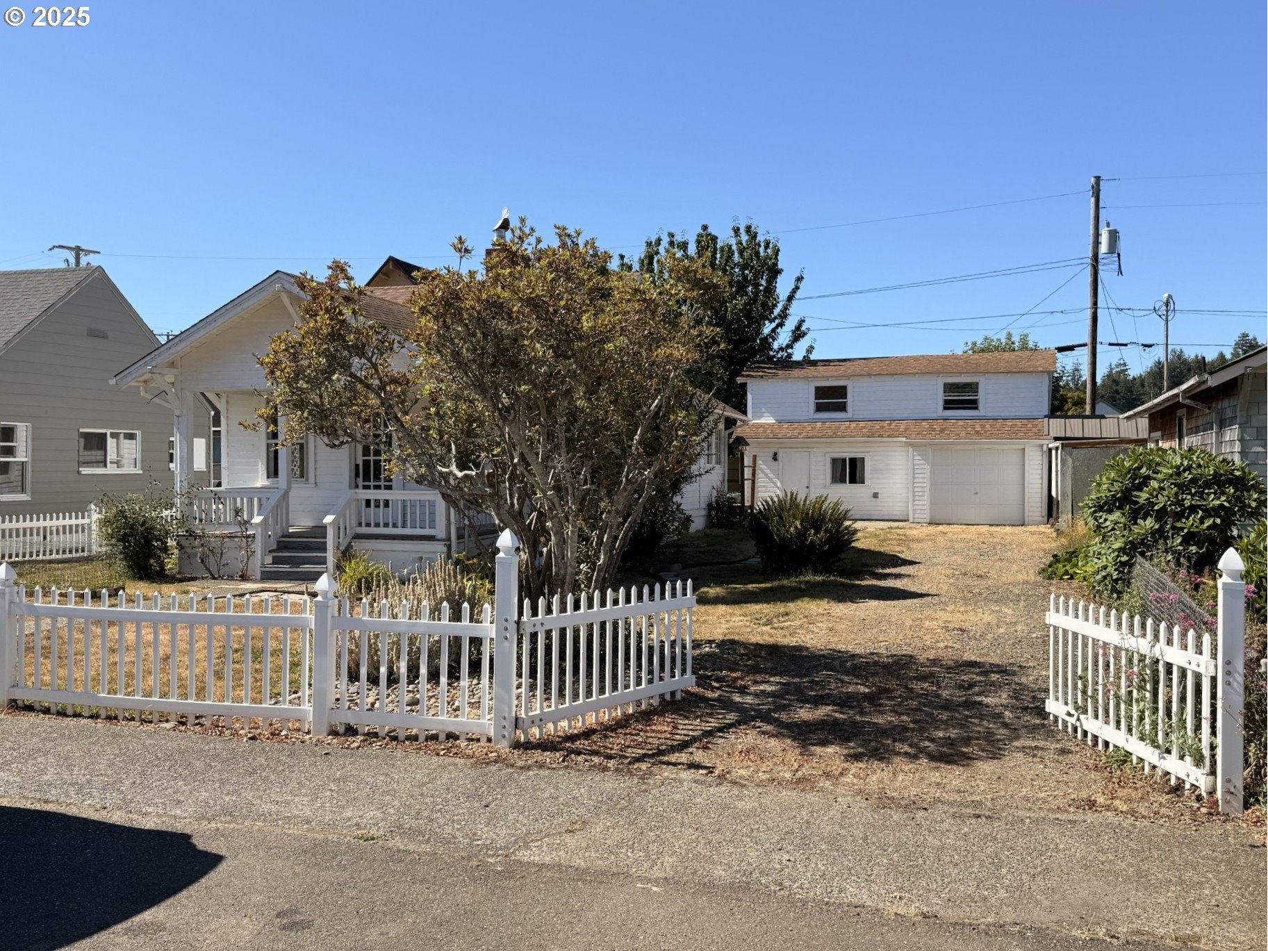 2149 Dogwood Avenue Reedsport, OR 97467 - Photo 41 of 41 a view of a house with a fence in front of it