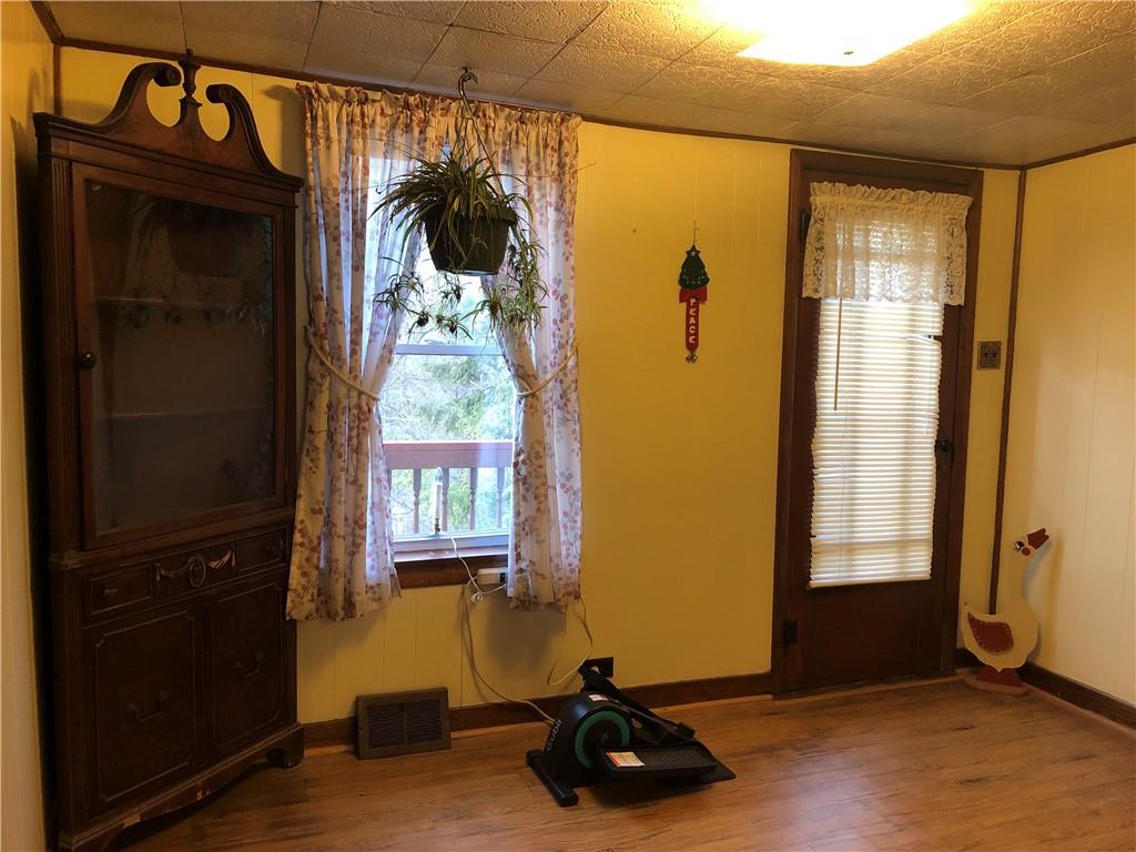 374 Ferguson Road Dunbar, PA 15431 - Photo 2 of 21 a room with window and gate