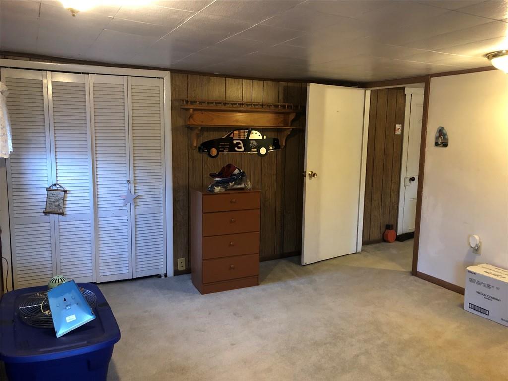 374 Ferguson Road Dunbar, PA 15431 - Photo 12 of 21 an empty room with closet and mirror