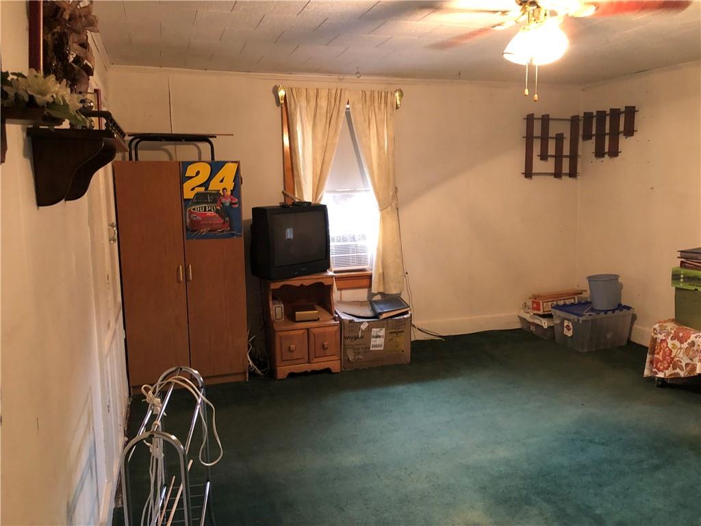 374 Ferguson Road Dunbar, PA 15431 - Photo 13 of 21 a view of a room with gym equipment