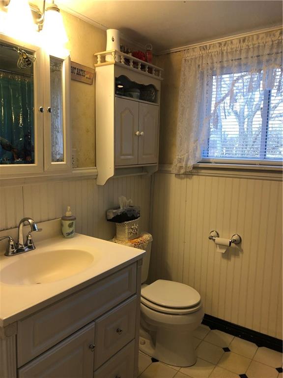 374 Ferguson Road Dunbar, PA 15431 - Photo 16 of 21 a bathroom with a sink a toilet and shower curtain