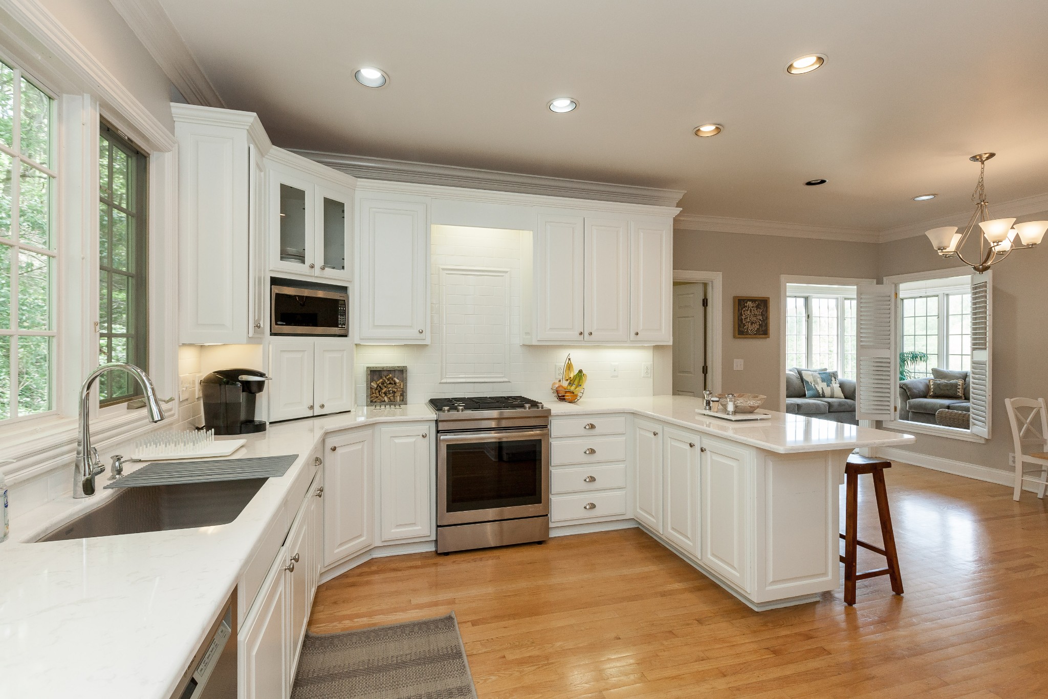 758 High Point Ridge Road Franklin, TN 37069 - Photo 11 of 28 a kitchen with stainless steel appliances granite countertop a sink stove and refrigerator