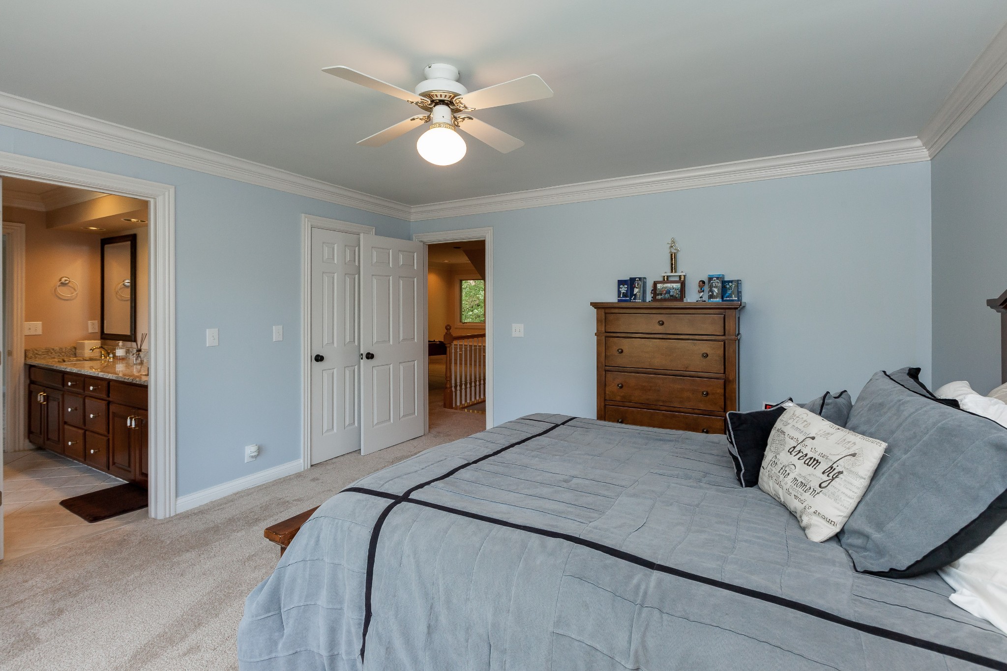 758 High Point Ridge Road Franklin, TN 37069 - Photo 22 of 28 a bedroom with a bed and a chandelier