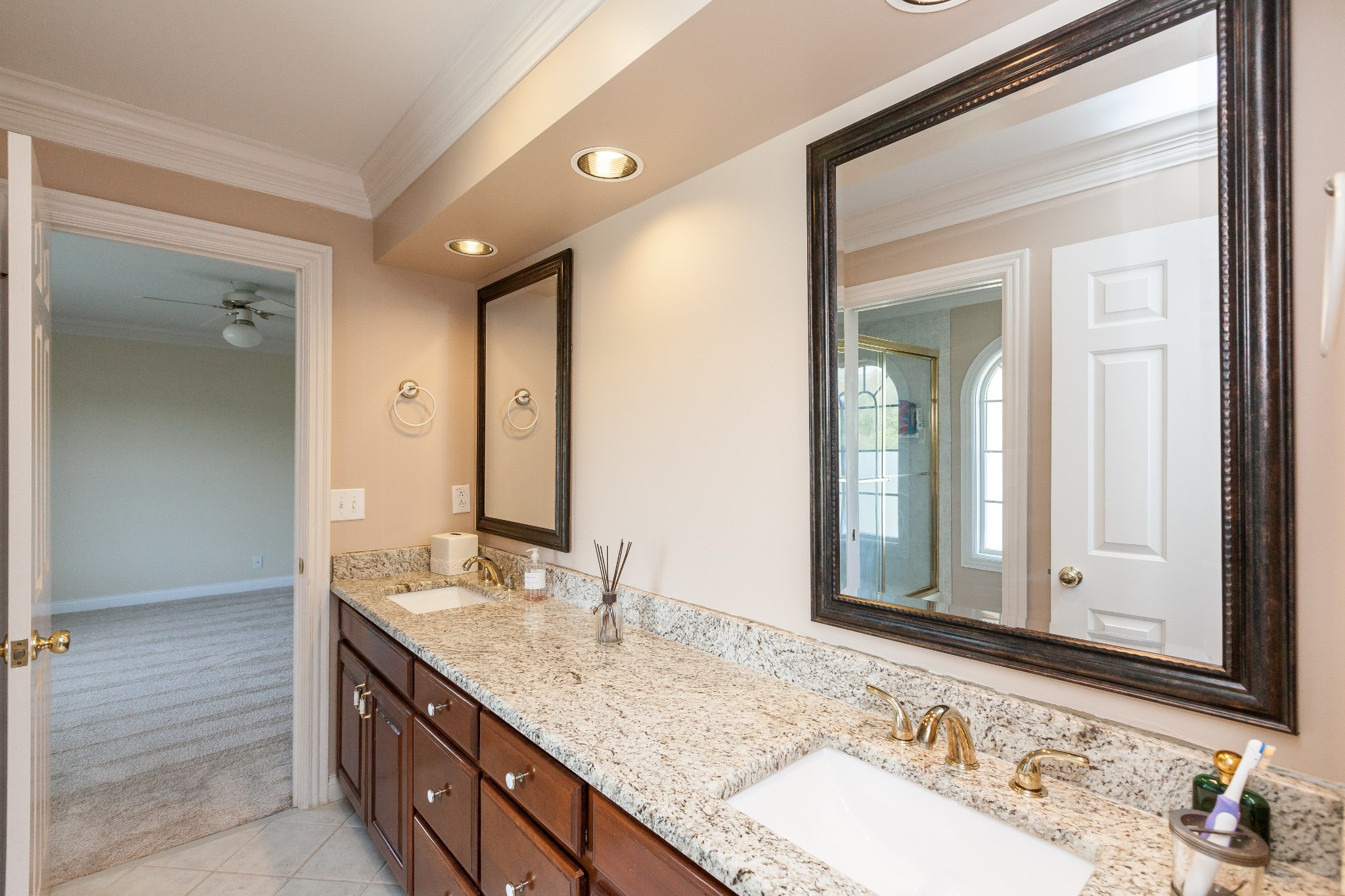 758 High Point Ridge Road Franklin, TN 37069 - Photo 23 of 28 a bathroom with a granite countertop double vanity sink and a mirror