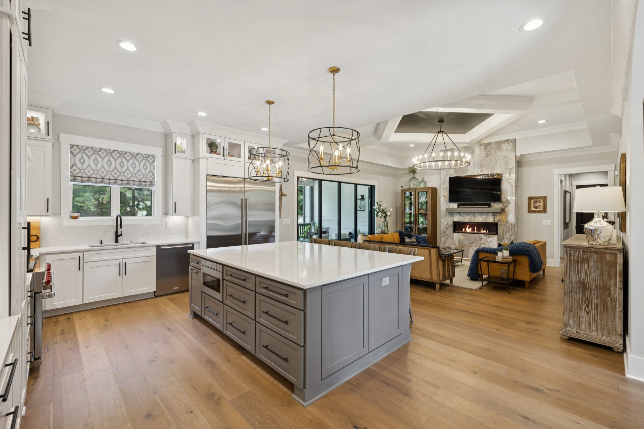 5012 Toll Rd Court Thompson's Station, TN 37179 - Photo 12 of 95 a large kitchen with stainless steel appliances granite countertop a stove and a wooden floors