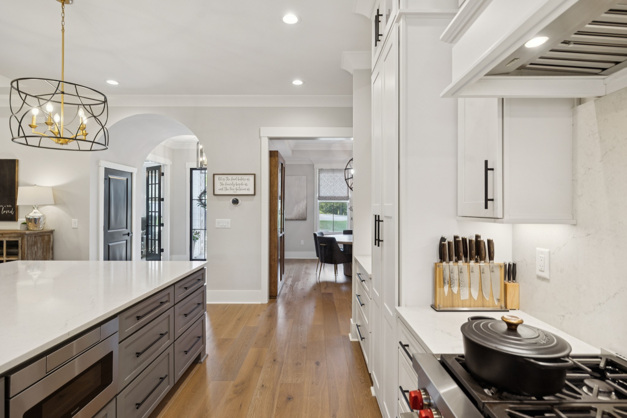 5012 Toll Rd Court Thompson's Station, TN 37179 - Photo 18 of 95 a kitchen with stainless steel appliances granite countertop a stove and white cabinets