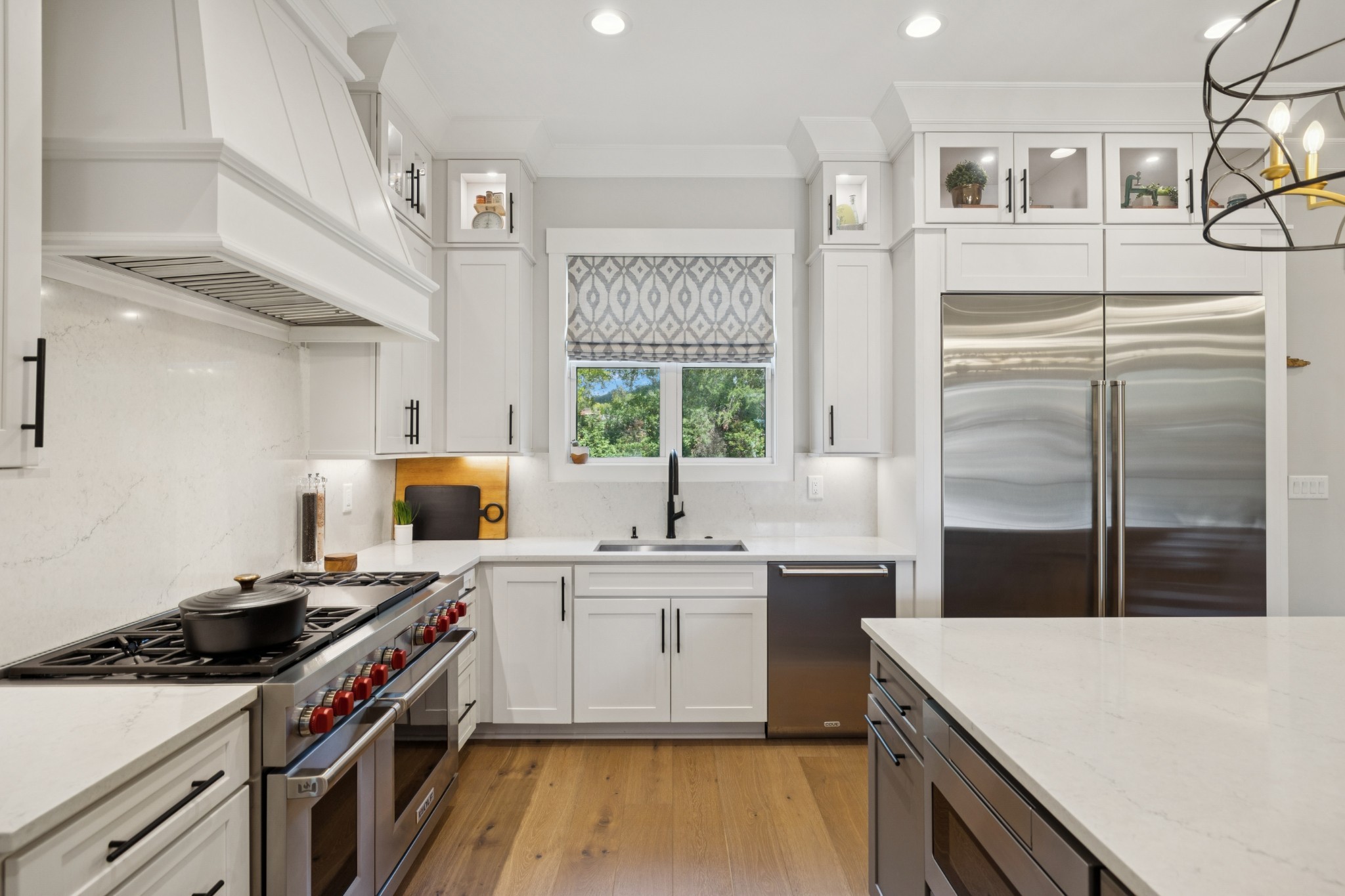 5012 Toll Rd Court Thompson's Station, TN 37179 - Photo 19 of 95 a kitchen with a sink stove and cabinets