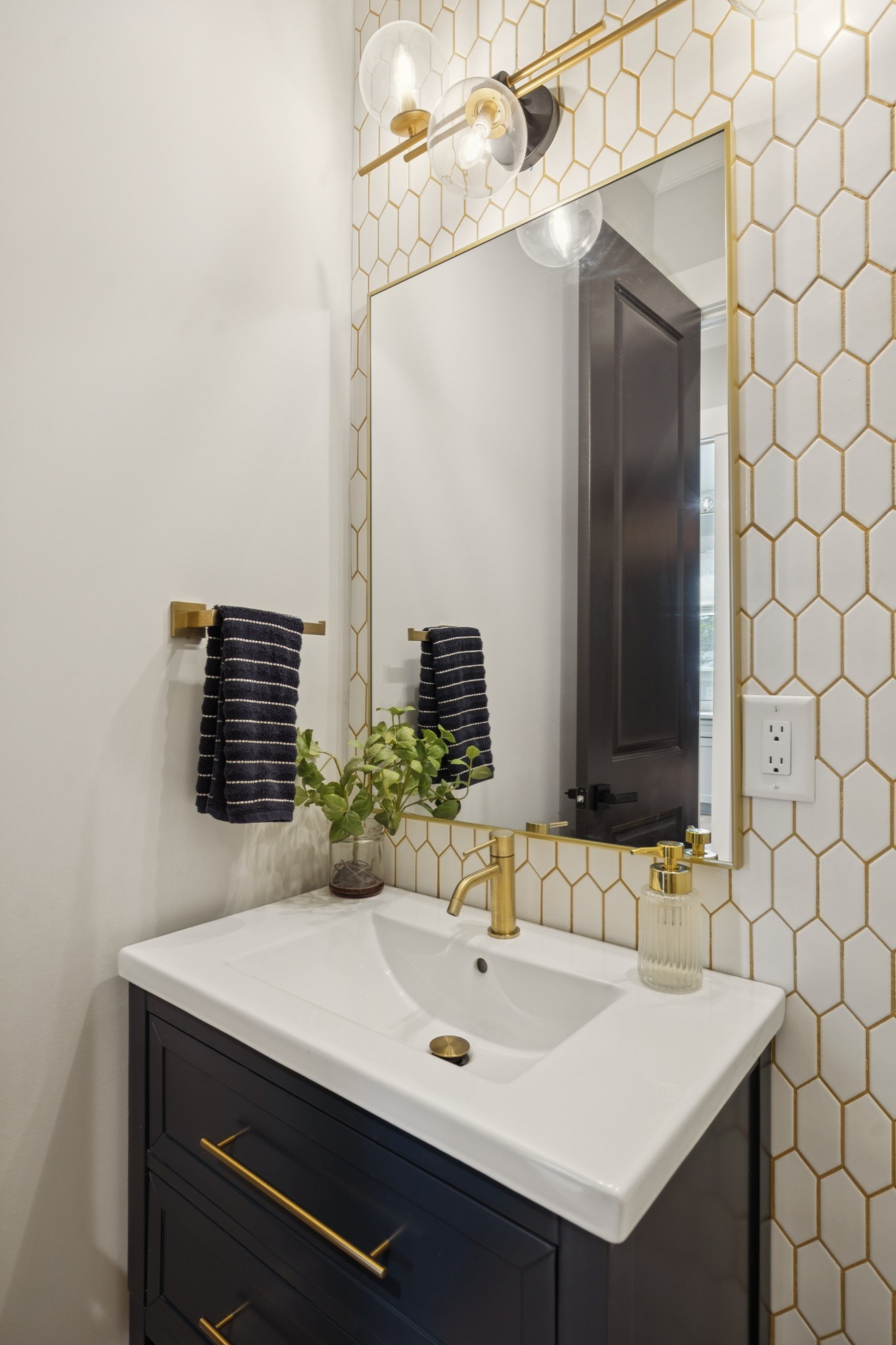 5012 Toll Rd Court Thompson's Station, TN 37179 - Photo 30 of 95 a bathroom with a sink and a mirror