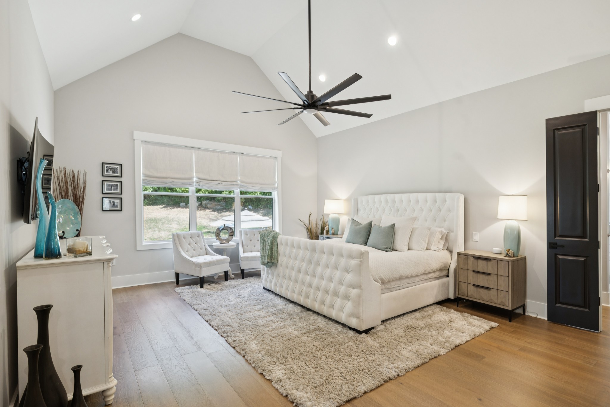5012 Toll Rd Court Thompson's Station, TN 37179 - Photo 31 of 95 a living room with furniture and a large window with kitchen view