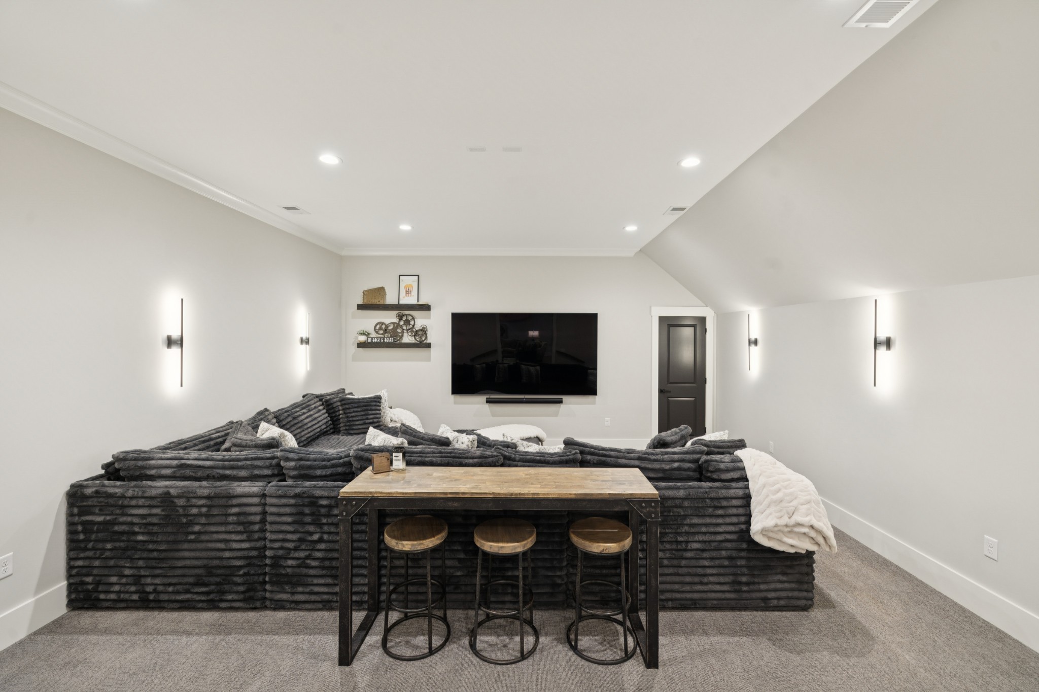5012 Toll Rd Court Thompson's Station, TN 37179 - Photo 58 of 95 a living room with furniture and a flat screen tv