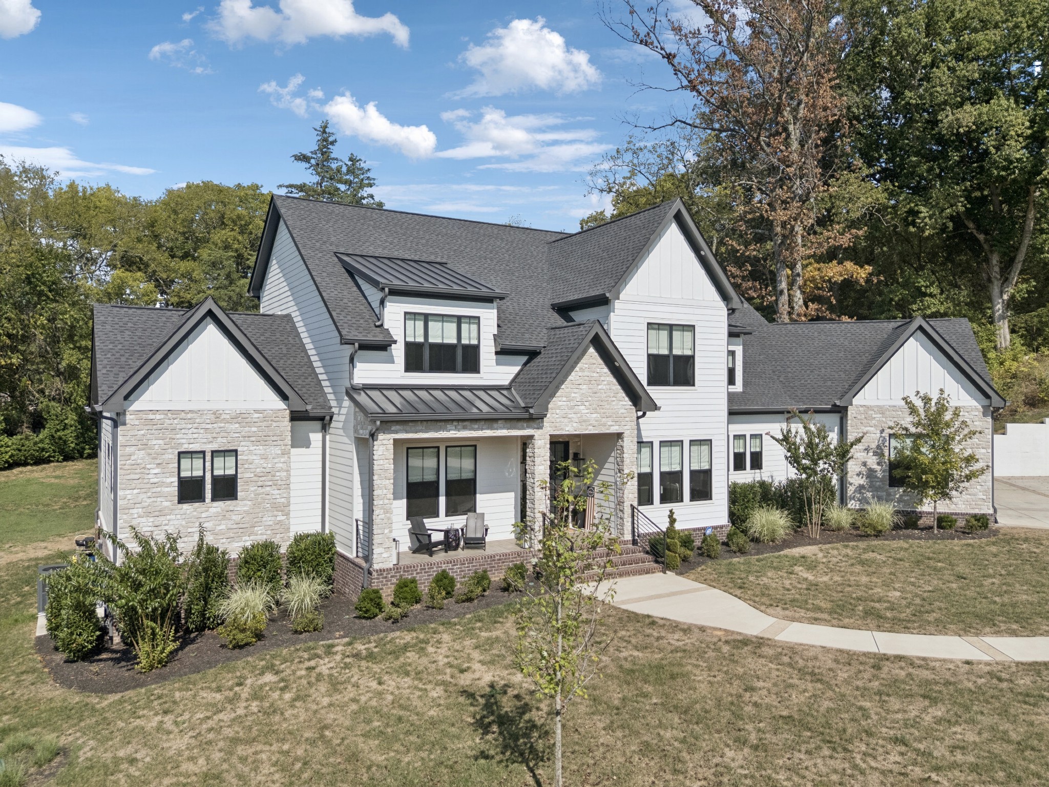 5012 Toll Rd Court Thompson's Station, TN 37179 - Photo 83 of 95 a front view of a house with a yard