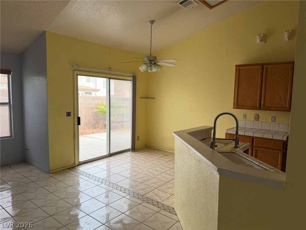 277 Gentle Bay Avenue Henderson, NV 89074 - Photo 26 of 43 This versatile space seamlessly connects indoor comfort with outdoor living.