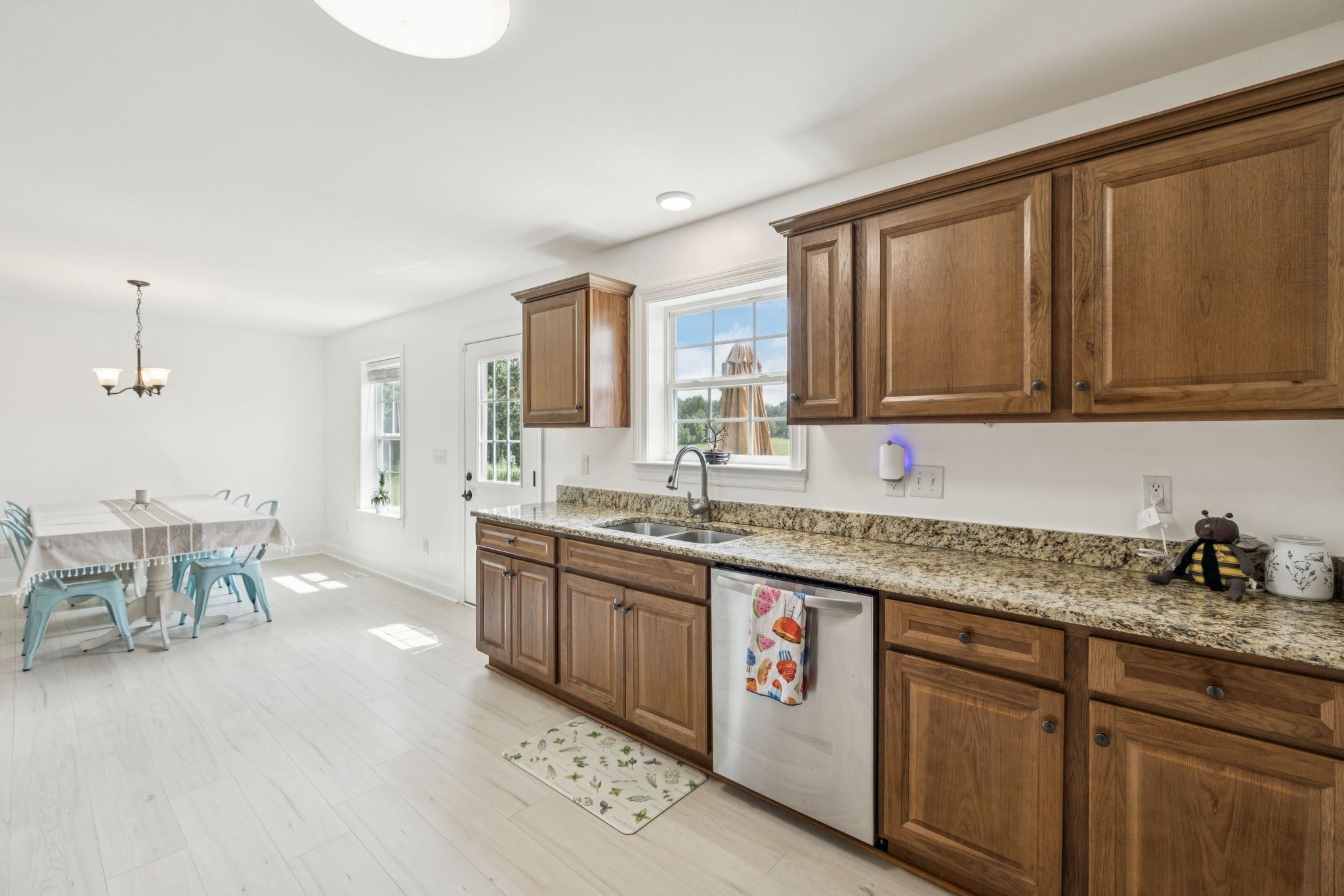 68 Taylor Road Manchester, TN 37355 - Photo 6 of 33 a kitchen with granite countertop sink cabinets and stainless steel appliances