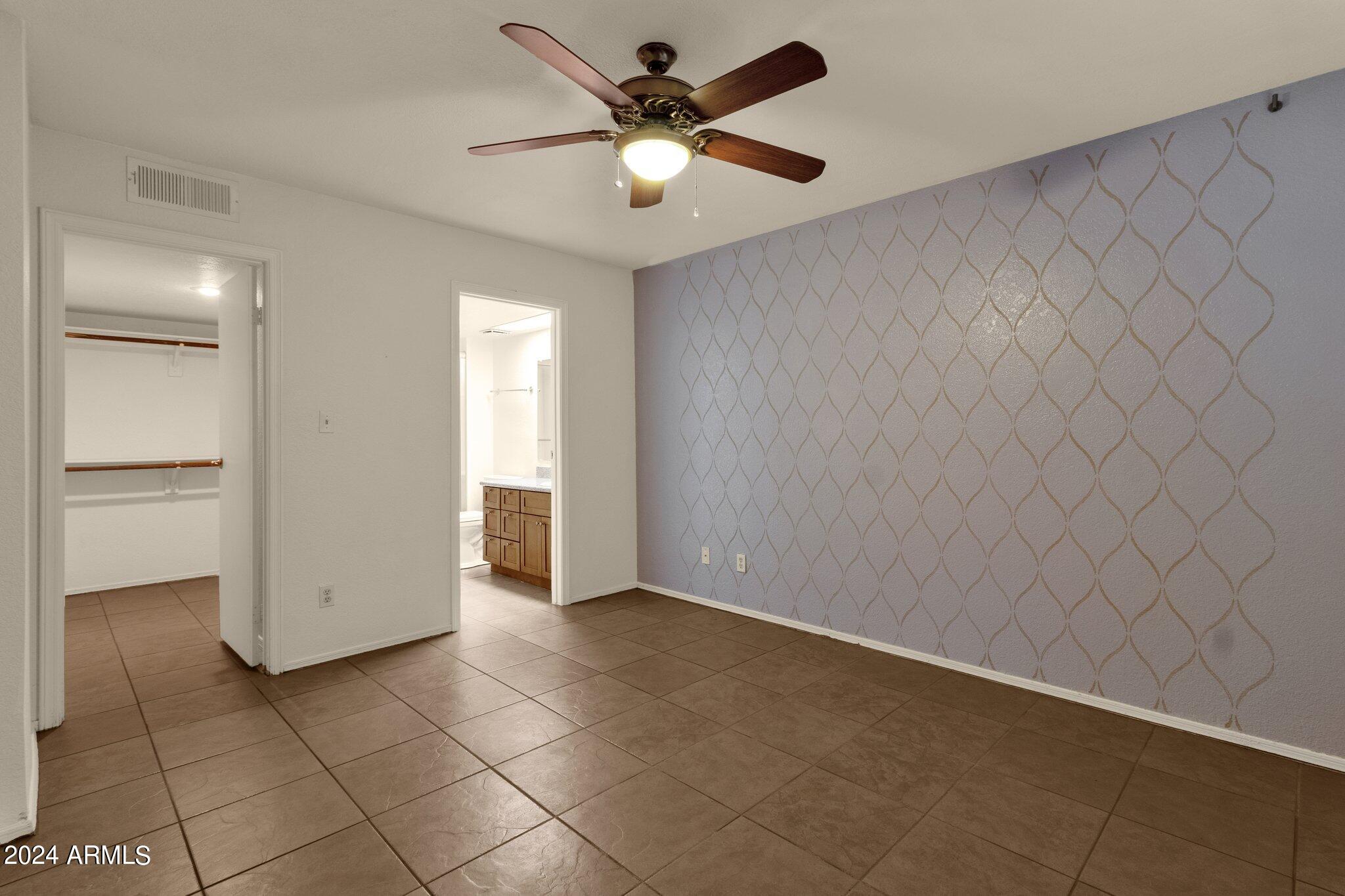 2855 South Ext Road, Unit 116 Mesa, AZ 85210 - Photo 13 of 27 Primary Bedroom 1