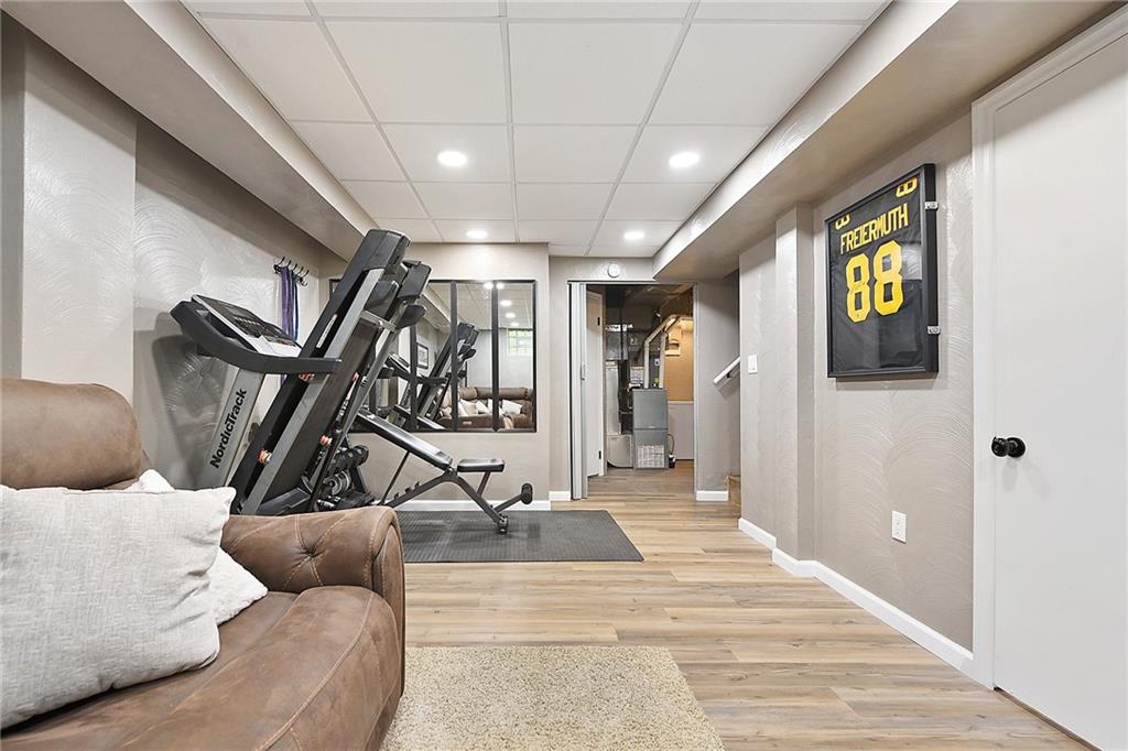 127 Sunset Drive Washington, PA 15301 - Photo 24 of 33 a living room with furniture and a flat screen tv