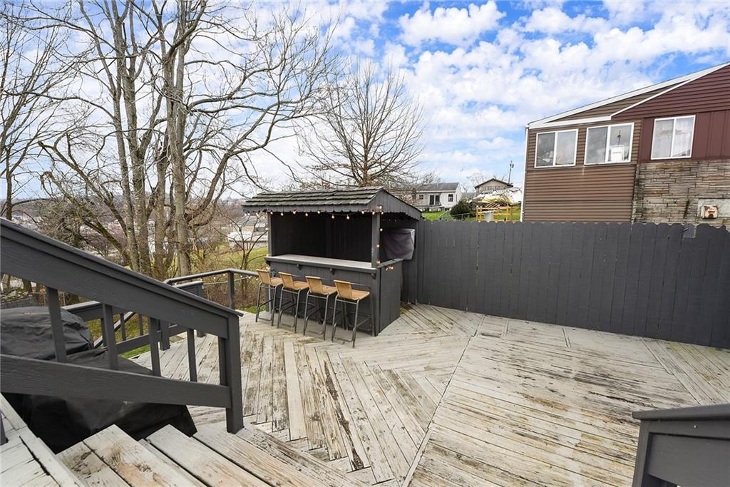 127 Sunset Drive Washington, PA 15301 - Photo 27 of 33 a backyard of a house with wooden floor and outdoor seating