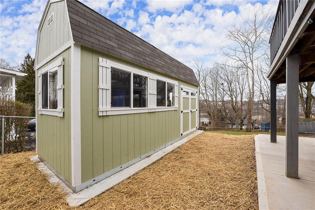 127 Sunset Drive Washington, PA 15301 - Photo 33 of 33 a view of a backyard with a large tree