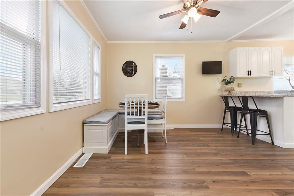127 Sunset Drive Washington, PA 15301 - Photo 7 of 33 a view of a dining room with furniture and wooden floor
