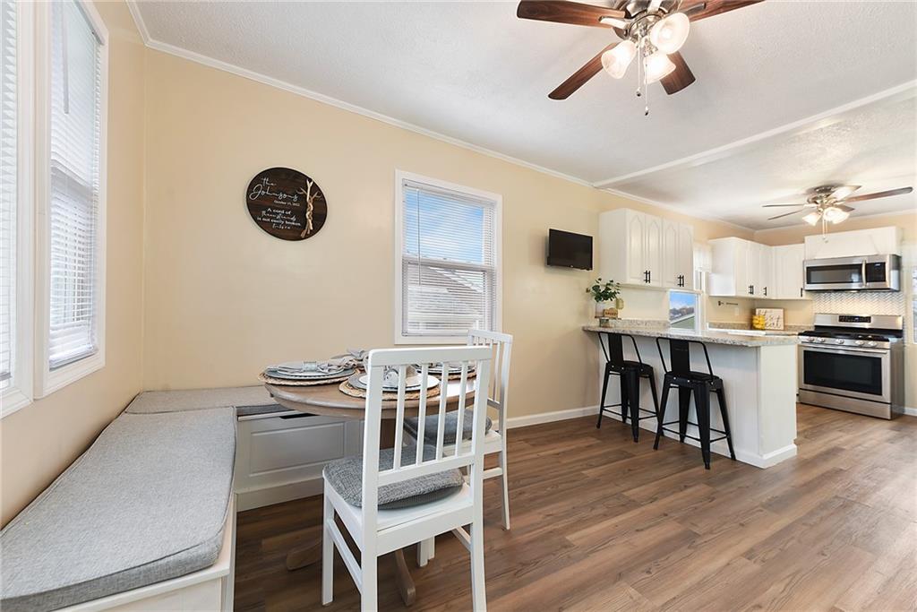 127 Sunset Drive Washington, PA 15301 - Photo 8 of 33 a view of kitchen and dining room with wooden floor